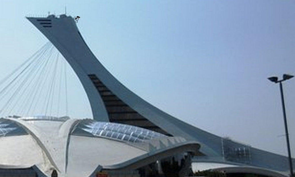 Montreal Cyclist Rides Down Olympic Stadium Tower!